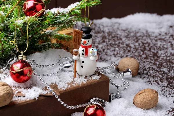Christmas greeting card fir tree snowman snow cones walnuts — Stock Photo, Image