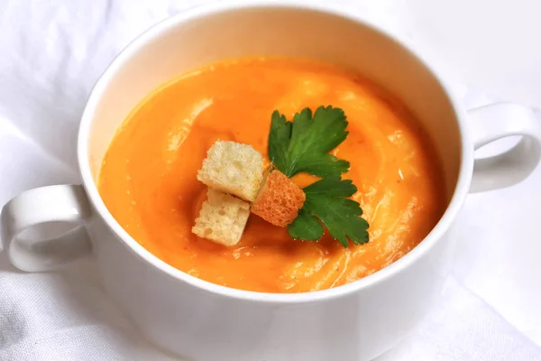 Pumpkin soup with garlic croutons top view — Stock Photo, Image