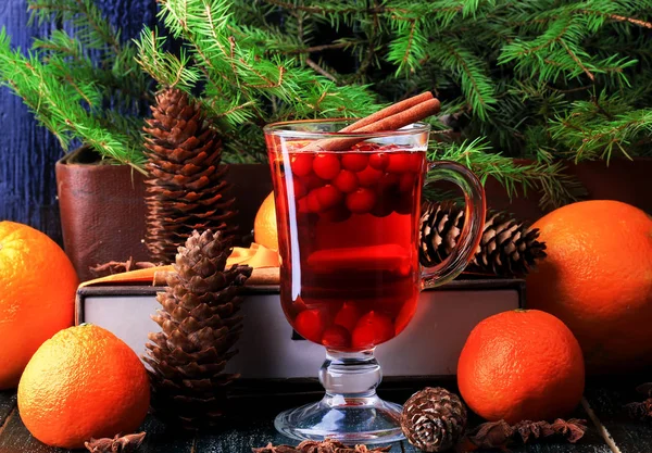 Hot winter drink with cranberry orange and cinnamon