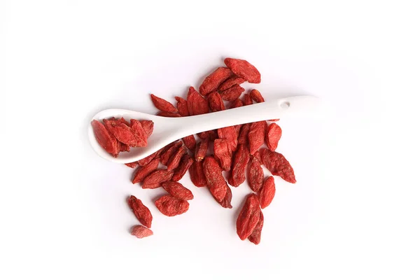 Bayas de goji aisladas sobre fondo blanco Imagen De Stock