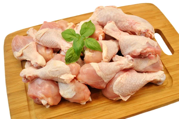 Raw Fresh Chicken Legs on a Wooden Cutting Board — Stock Photo, Image