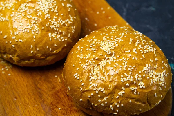 Sesame buns baked especially for homemade burgers — Stock Photo, Image