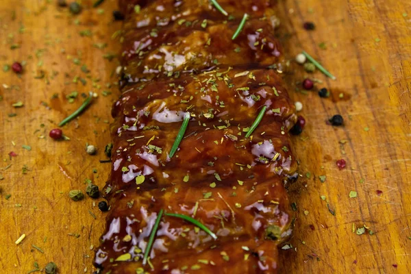 Barbecue Pork Spare Ribs close-up as top view on an old cutting board — 스톡 사진