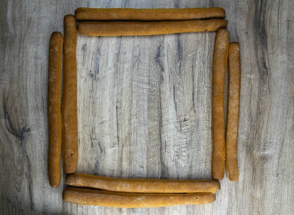 Montón de palitos de pan o forma cuadrada grissini vista cuadrada — Foto de Stock