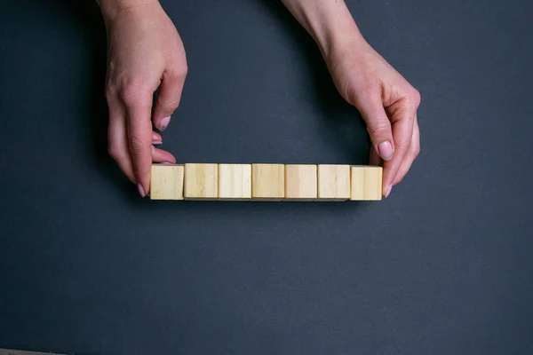 Two Hands Hold Wooden Cubes Provided Space Text — Stock Photo, Image
