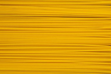 Sarı uzun spagetti arka plan yakın plan. Makro fotoğrafçılık.