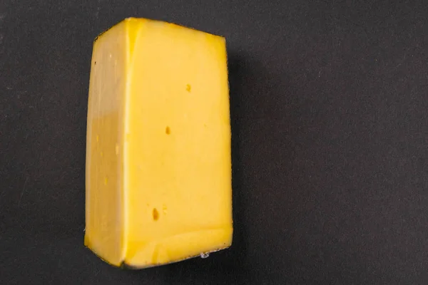 Gros Morceau Fromage Suisse Sur Fond Noir Vue Latérale Produits — Photo