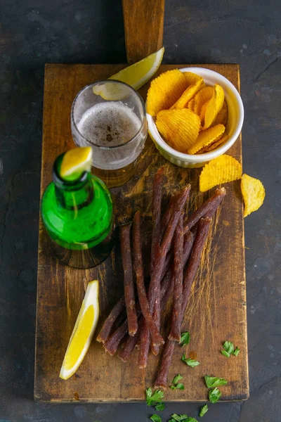 Fish Caviar Snack Beer Lemon Potato Chips Dark Wooden Board — Stock Photo, Image