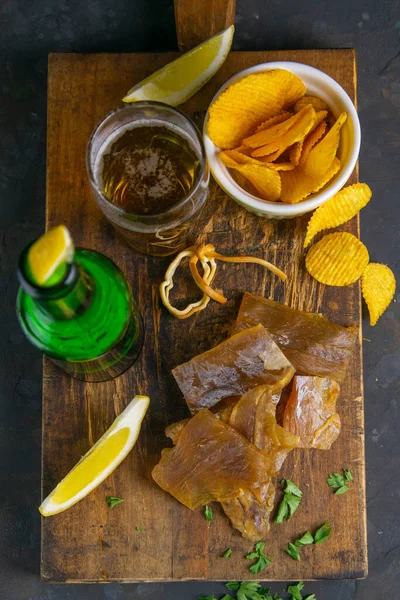 Dried Catfish Fillet Beer Lemon Potato Chips Dark Wooden Board — Stock Photo, Image