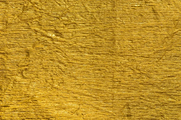 Oro arrugado lámina metálica textura de fondo — Foto de Stock