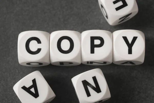 Word copy on toy cubes — Stock Photo, Image