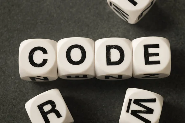Word kódot a játék kocka — Stock Fotó