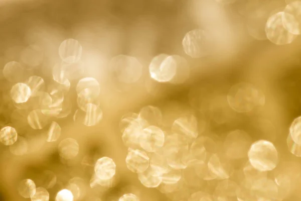 Dourado abstrato luzes embaçadas fundo — Fotografia de Stock