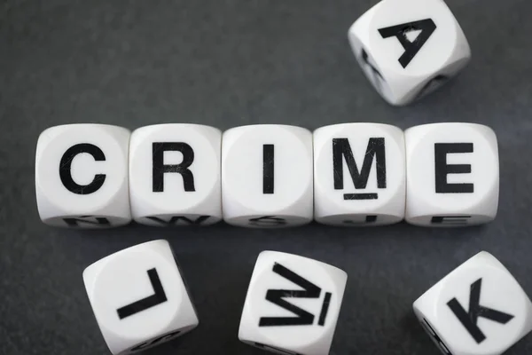 Word crime on toy cubes — Stock Photo, Image