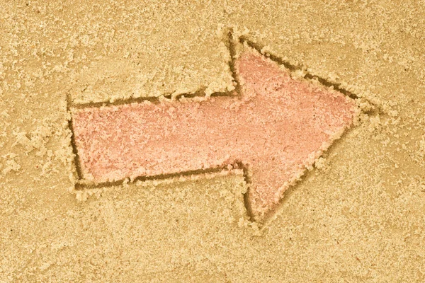 砂で描く矢印記号 — ストック写真