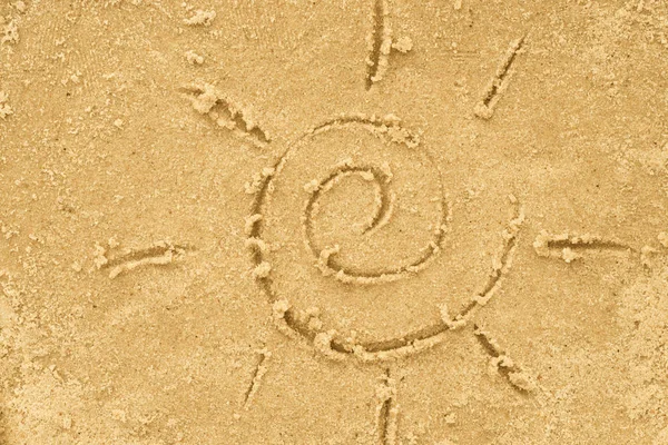 Desenho do sol na areia — Fotografia de Stock