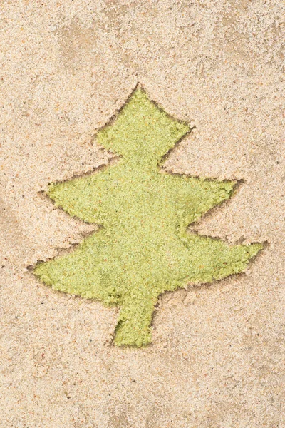 Christmas tree drawing in sand