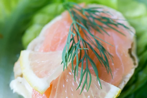 Healthy small open sandwich with smoked salmon selective focus — Stock Photo, Image