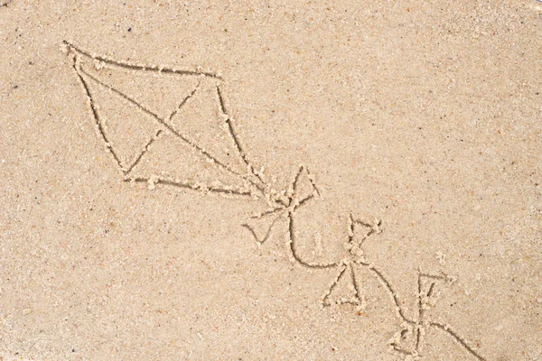 Kite dibujo en arena —  Fotos de Stock