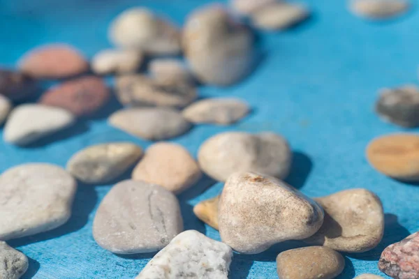 Pebble stones in water — Stock Photo, Image