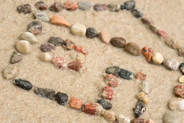 砂の選択と集中の小石 · ウーデ図形 — ストック写真