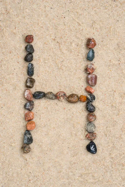 小石の砂の上」の文字 — ストック写真