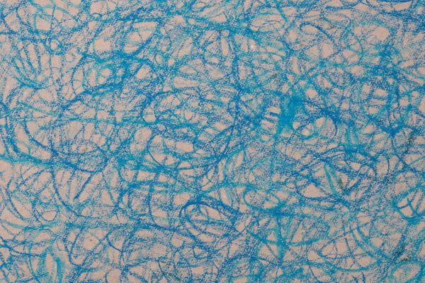Сині крейдяні каракулі, що малюють на коричневому папері — стокове фото