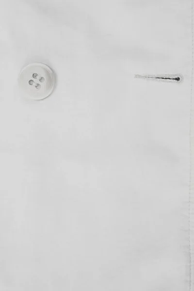 Ecru tkanina tło przycisku i dziurki — Zdjęcie stockowe