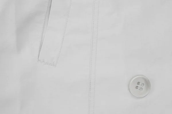 Režná tkanina s kapsou a tlačítko pozadí — Stock fotografie
