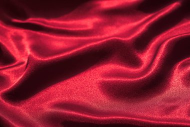kırmızı dalgalı ipek Tekstil doku arka plan seçici odak