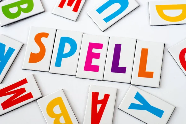 Word spell  made of colorful letters — Stock Photo, Image