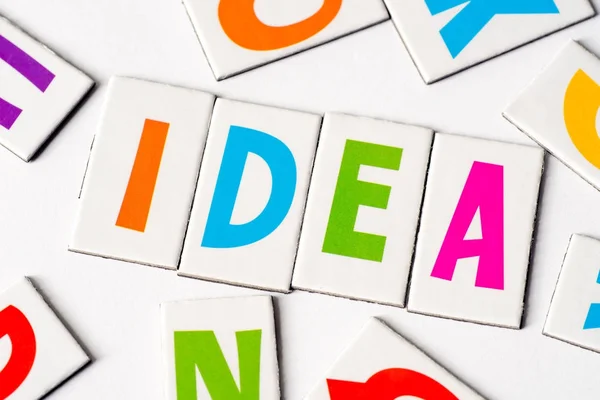 Palabra idea hecha de letras coloridas — Foto de Stock