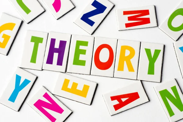 Slovo teorie z barevných písmen — Stock fotografie