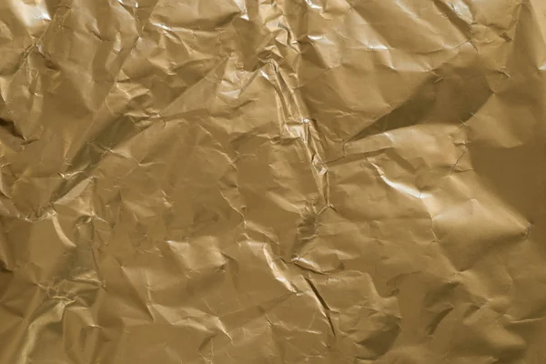 Fondo de textura de papel doblado oro — Foto de Stock