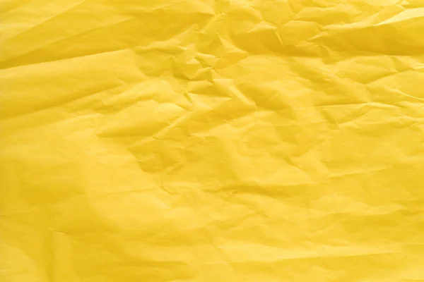 Sárga gyűrött papír szövet háttér textúra — Stock Fotó
