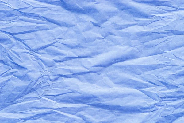 Tekstura tkanek niebieski pognieciony papier — Zdjęcie stockowe