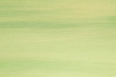 Kağıt arka plan dokusu üzerinde yeşil suluboya boyalı