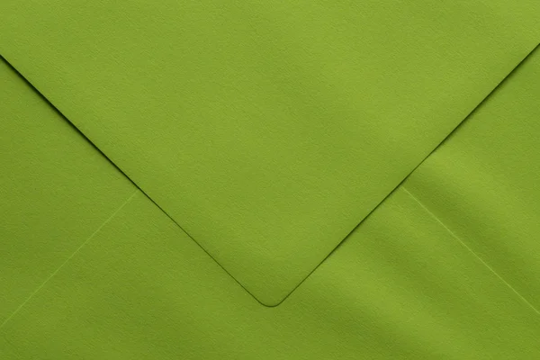 Зелений порожній конверт макро фон — стокове фото