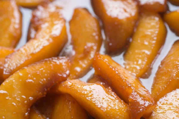 Fried in sugar carmelised pieces of quince — Stock Photo, Image