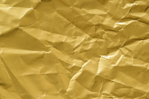 Fondo de textura de papel arrugado dorado — Foto de Stock