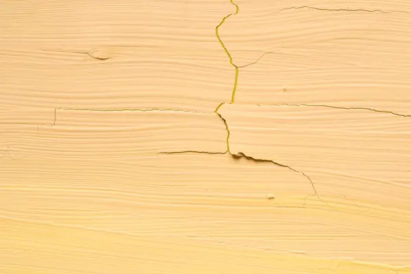 Żółty pęknięty tekstury żółty malowane tła — Zdjęcie stockowe