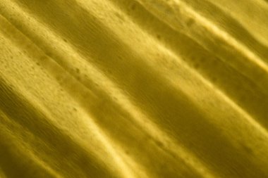 Sarı kağıt arka plan doku ışık glints 