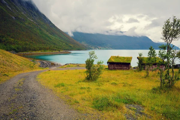 Dirt road to fjord — Stock Photo, Image
