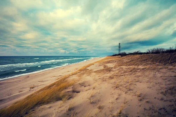 Sea shore with cloudy sky — Stock Photo, Image