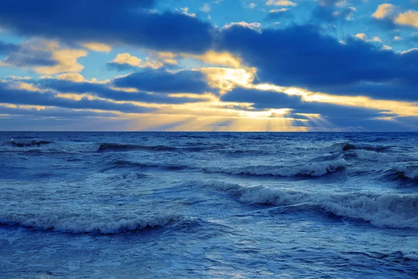 Sunset over the sea with dramatic sky — Stock Photo, Image