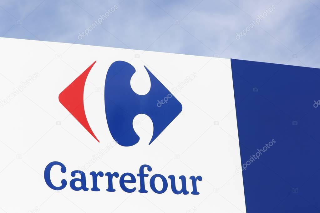 Macon, France - October 10, 2016: Carrefour sign on a panel. Carrefour is a french multinational retailer headquartered in France and it is one of the largest hypermarket chains in the world