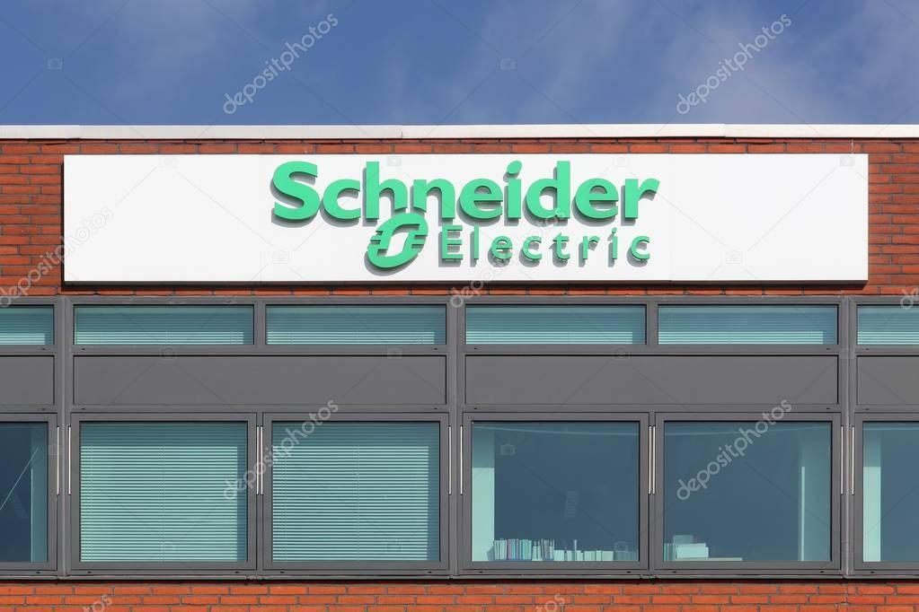 Odense, Denmark - April 2, 2017: Schneider Electric logo on a facade. Schneider Electric is a European multinational corporation, leader in automation and electricity management
