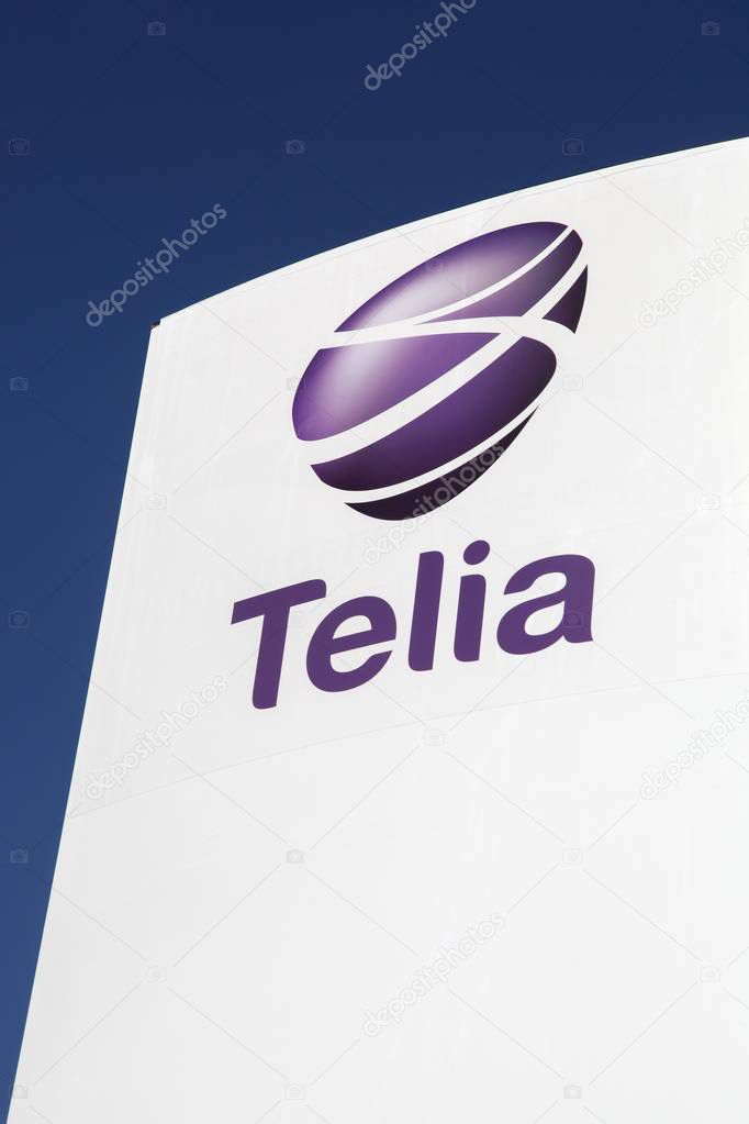 Odense, Denmark - April 9, 2017: Telia logo on a panel. Telia is the dominant telephone company and mobile network operator in Sweden and Finland
