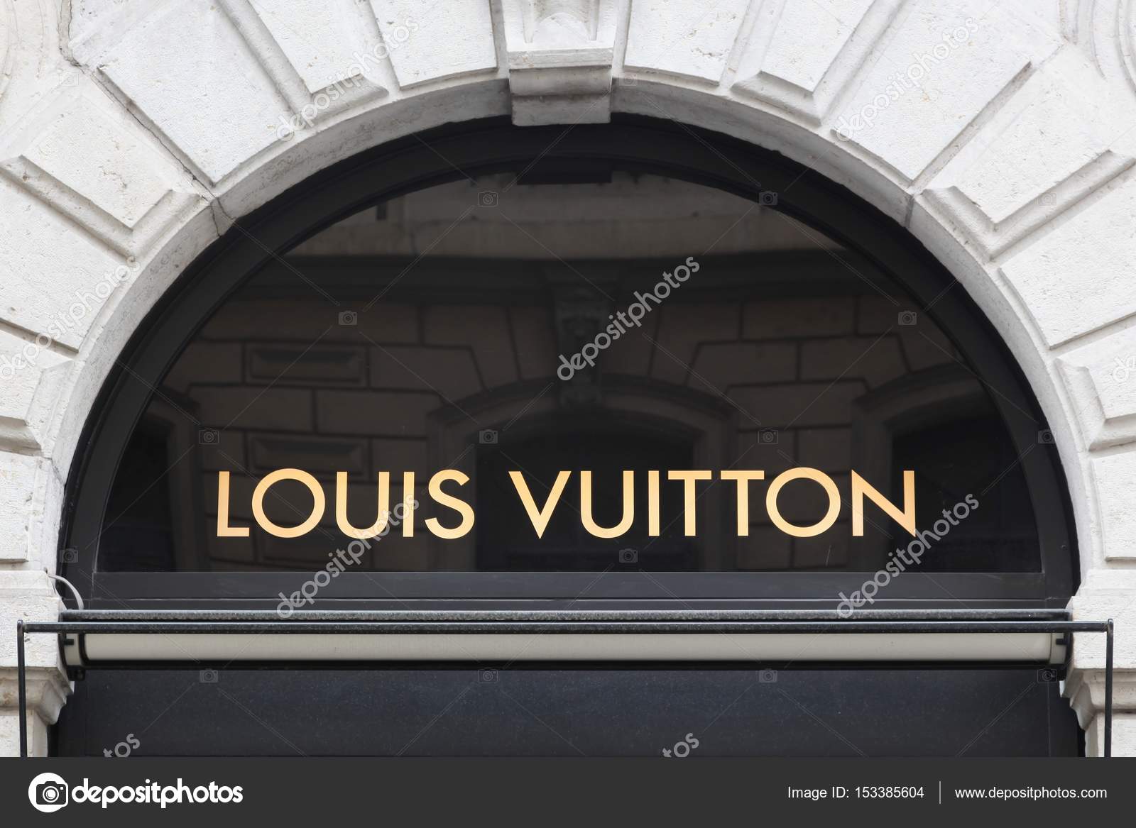 Louis Vuitton logo sign attached to the wall