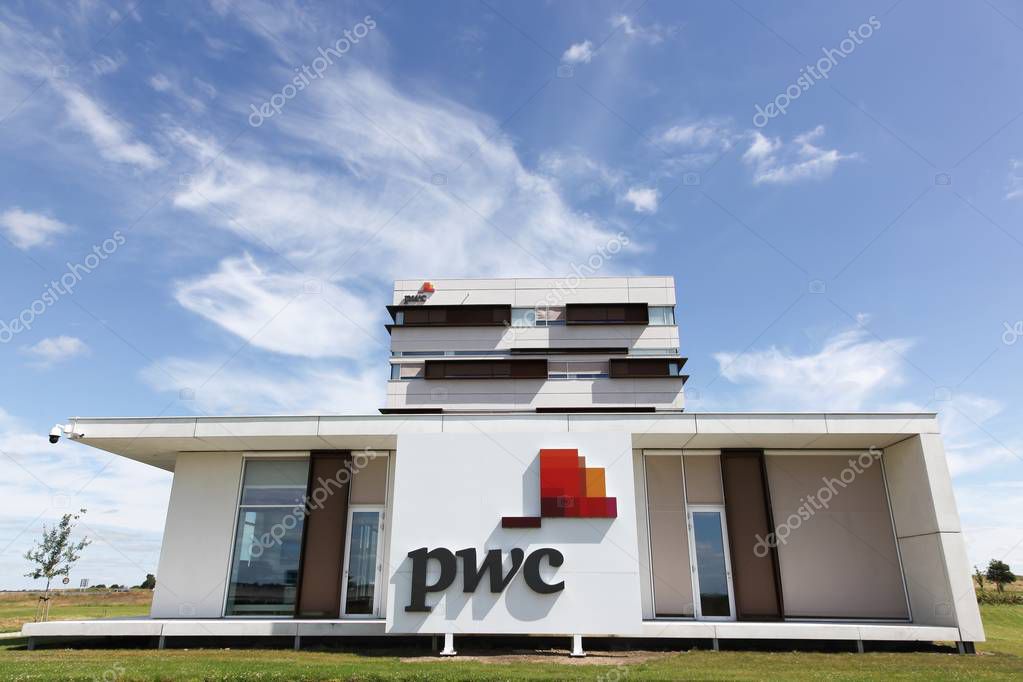 Vejle, Denmark - July 9, 2017: PricewaterhouseCoopers building. PricewaterhouseCoopers is a multinational professional services network and It is the largest professional services firm in the world